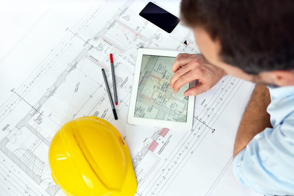 Architect planning the construction of a fire safety design on board