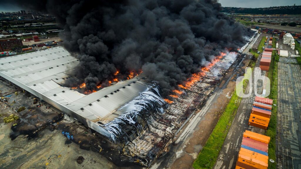 Smoke Control in Commercial Buildings: Your Guide to Enhanced Safety image of warehouse burning in Durban KZN South Africa